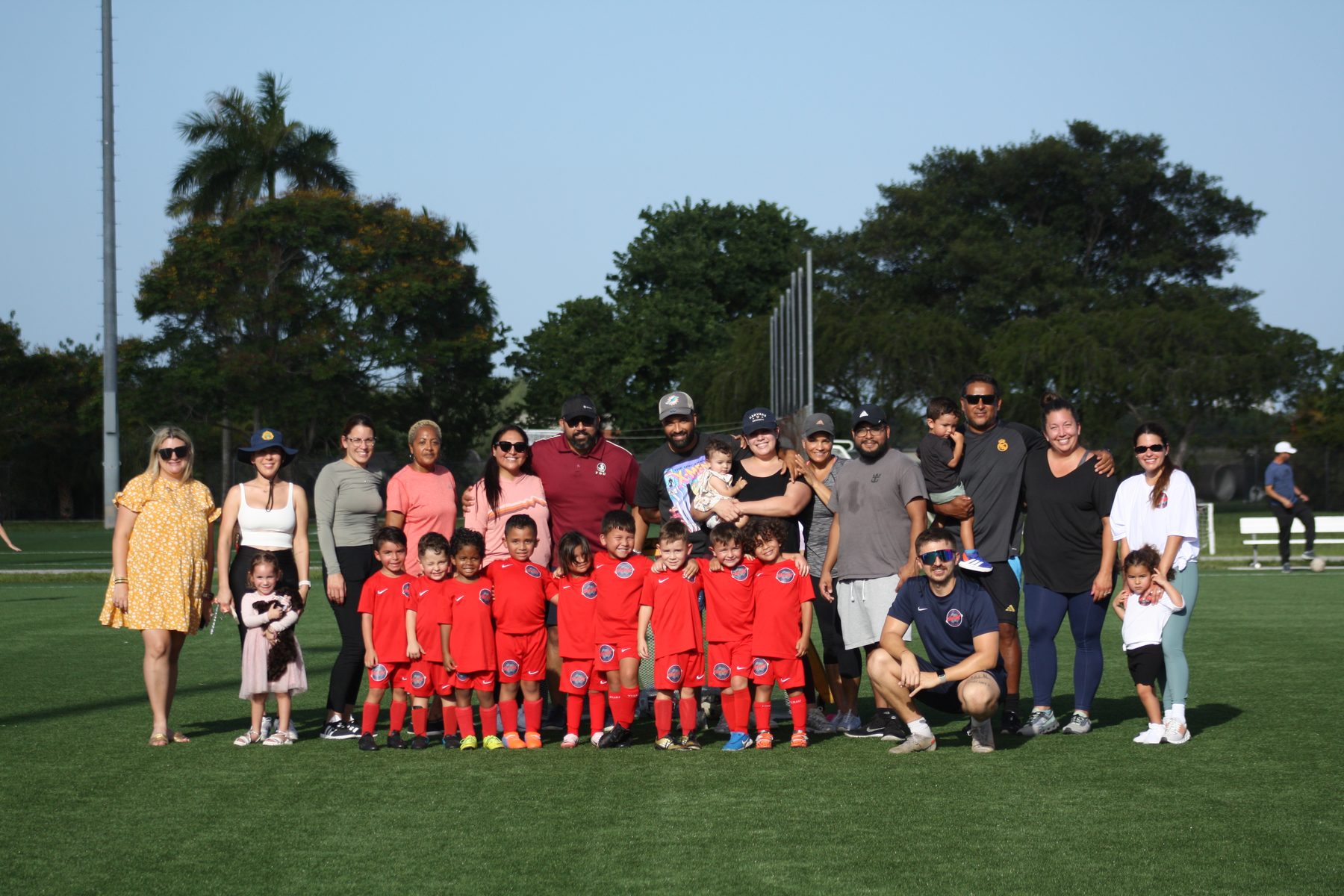 SFK Soccer Academy players, coaches, and parents together at the field